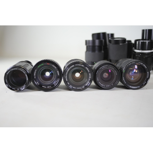 44 - Collection of 31 Camera Lenses:

1. Rolleinar-MC 135mm Lens - Clear optics with some internal dust n... 