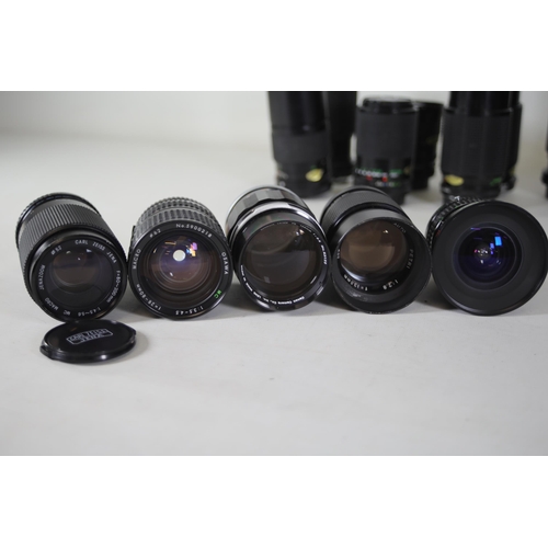 44 - Collection of 31 Camera Lenses:

1. Rolleinar-MC 135mm Lens - Clear optics with some internal dust n... 