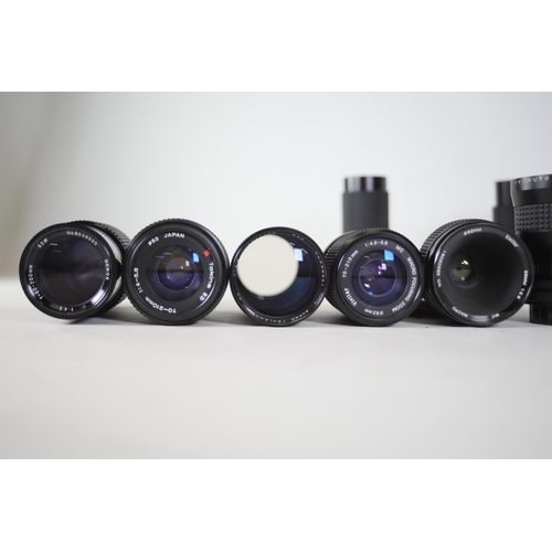 44 - Collection of 31 Camera Lenses:

1. Rolleinar-MC 135mm Lens - Clear optics with some internal dust n... 