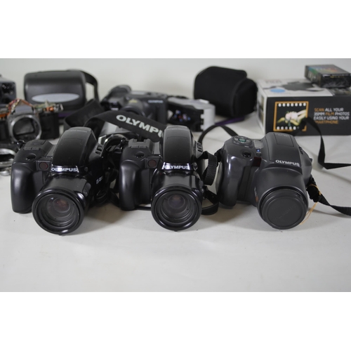 47 - Job Lot Video Cameras and a Camera Lens plus some polaroid style cameras