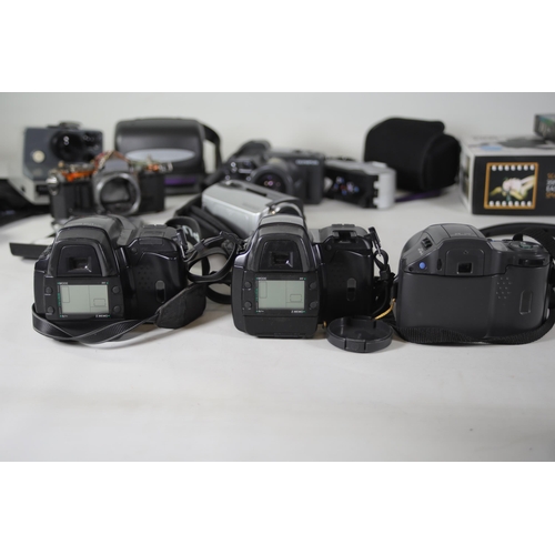 47 - Job Lot Video Cameras and a Camera Lens plus some polaroid style cameras