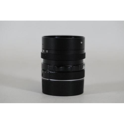 50 - A Leica Elmarit-M 28mm f2.8 Lens, 1913-1983 edition, serial number 3206179