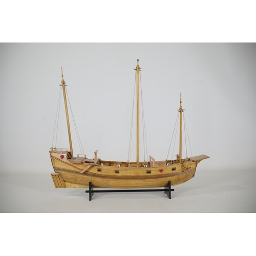 53 - Partially completed Chinese Junk model with 8 fitted cannons, measuring approximately 37cm in length... 