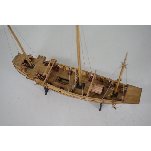 53 - Partially completed Chinese Junk model with 8 fitted cannons, measuring approximately 37cm in length... 