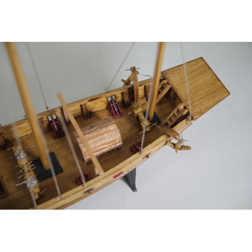 53 - Partially completed Chinese Junk model with 8 fitted cannons, measuring approximately 37cm in length... 