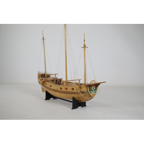 53 - Partially completed Chinese Junk model with 8 fitted cannons, measuring approximately 37cm in length... 