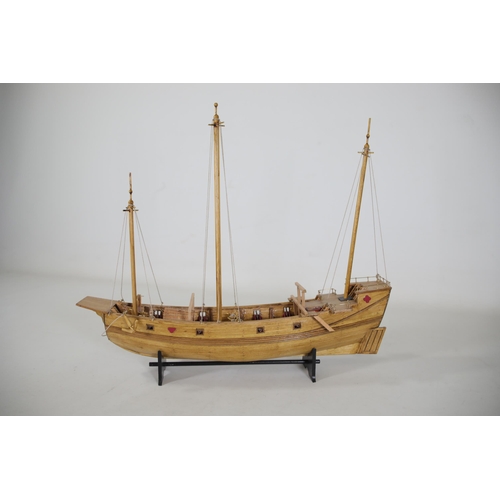 53 - Partially completed Chinese Junk model with 8 fitted cannons, measuring approximately 37cm in length... 