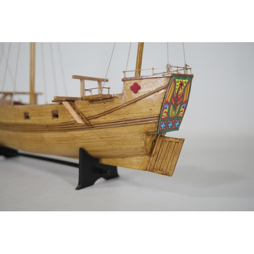 53 - Partially completed Chinese Junk model with 8 fitted cannons, measuring approximately 37cm in length... 