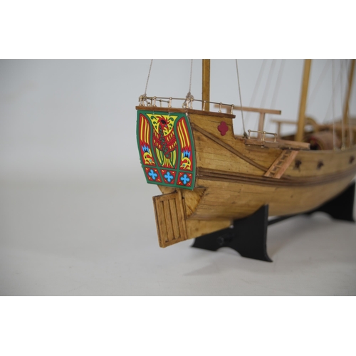 53 - Partially completed Chinese Junk model with 8 fitted cannons, measuring approximately 37cm in length... 