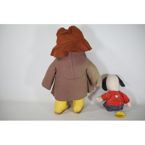 76 - 1 Paddington Bear 1970's and 1 Snoopy 1950's.