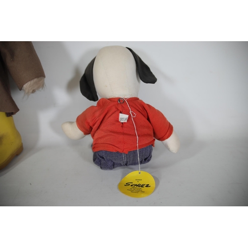 76 - 1 Paddington Bear 1970's and 1 Snoopy 1950's.