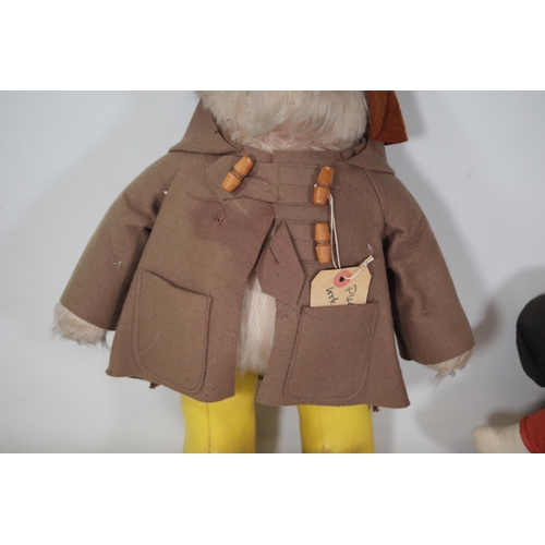 76 - 1 Paddington Bear 1970's and 1 Snoopy 1950's.