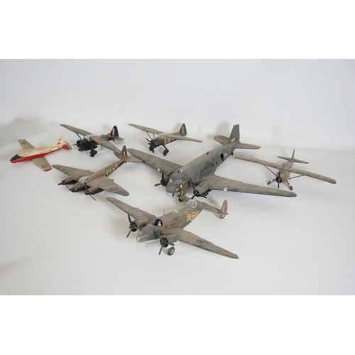 77 - Collection of Scale Model Planes, Army Vehicles, and Houses

Large collection of various scale model... 