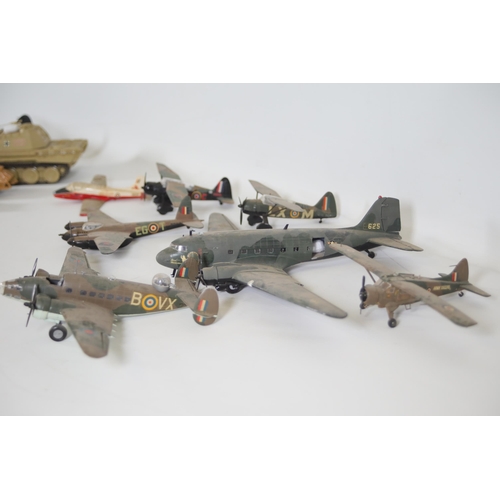 77 - Collection of Scale Model Planes, Army Vehicles, and Houses

Large collection of various scale model... 