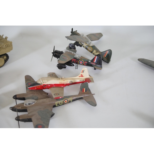 77 - Collection of Scale Model Planes, Army Vehicles, and Houses

Large collection of various scale model... 