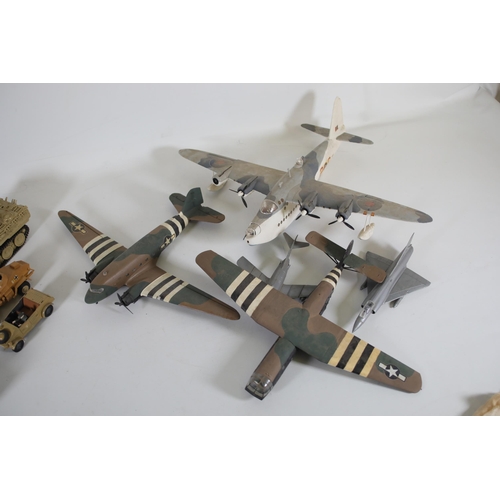 77 - Collection of Scale Model Planes, Army Vehicles, and Houses

Large collection of various scale model... 