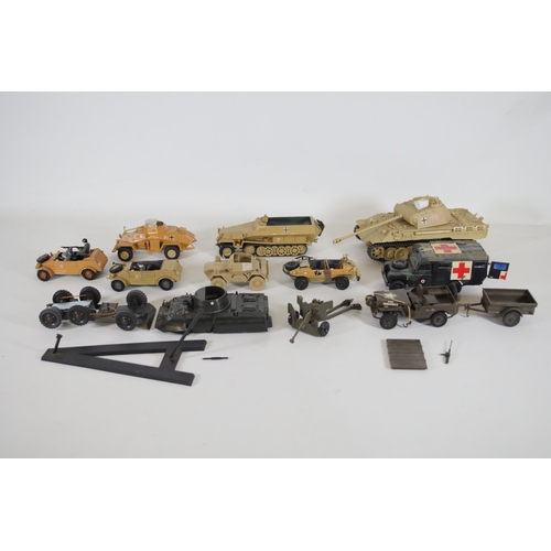 77 - Collection of Scale Model Planes, Army Vehicles, and Houses

Large collection of various scale model... 