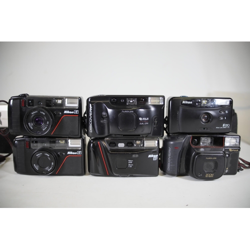 9 - Nikon and Fuji Compact Cameras x11
1. Nikon AF3 - Shutter works once or twice then stops, cosmetical... 