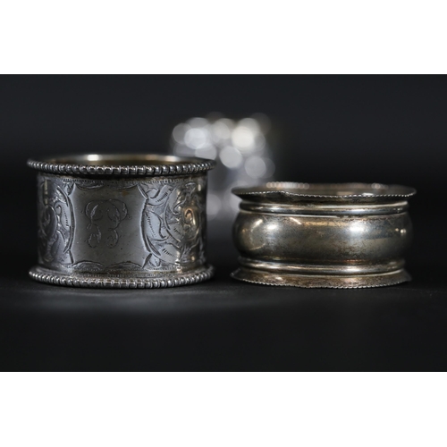 94 - 5 Silver Hallmarked Napkin Rings and 1 Other - The set includes 5 silver napkin rings weighing a tot... 