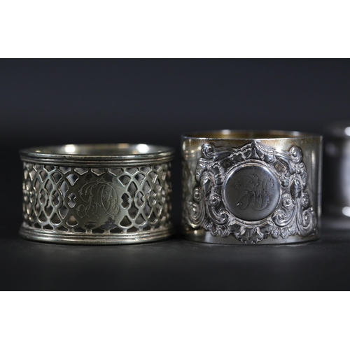 94 - 5 Silver Hallmarked Napkin Rings and 1 Other - The set includes 5 silver napkin rings weighing a tot... 