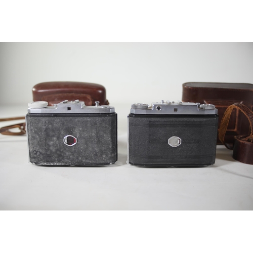 1 - **Collection of Vintage Folding and Rangefinder Cameras Including Zeiss Ikon and Agfa Models**  This... 