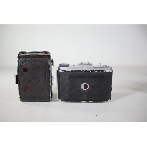 1 - **Collection of Vintage Folding and Rangefinder Cameras Including Zeiss Ikon and Agfa Models**  This... 