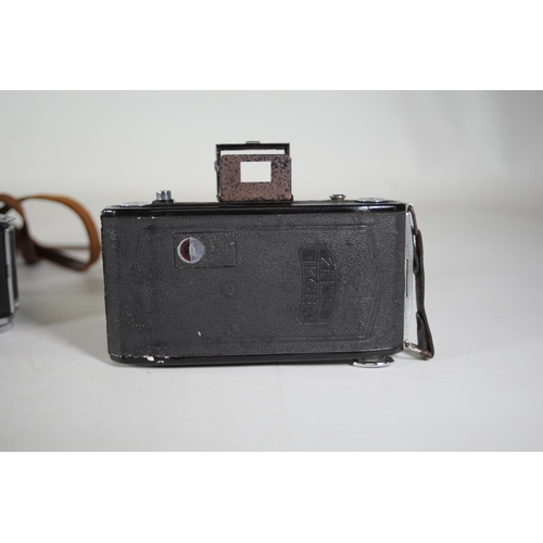 1 - **Collection of Vintage Folding and Rangefinder Cameras Including Zeiss Ikon and Agfa Models**  This... 