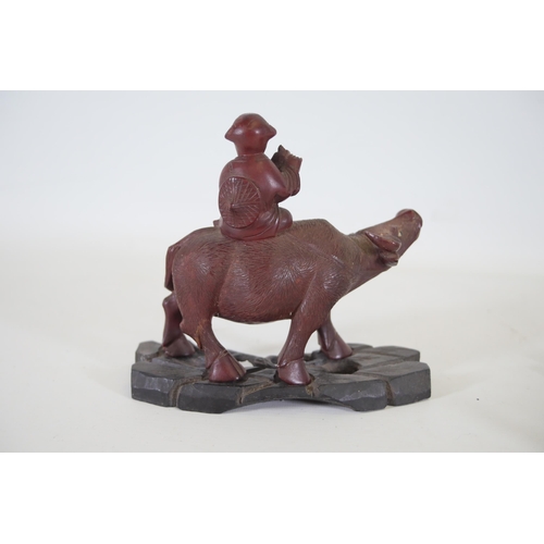 29 - Pair of 19th/20th-Century Antique Chinese Ornaments Depicting People Riding Oxen  This exquisite pai... 