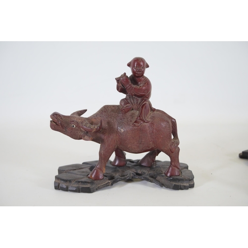 29 - Pair of 19th/20th-Century Antique Chinese Ornaments Depicting People Riding Oxen  This exquisite pai... 