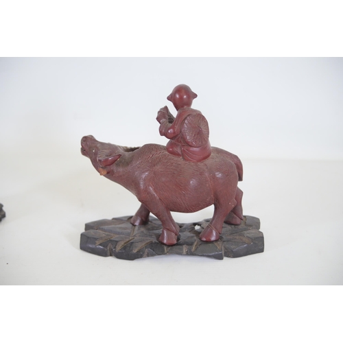 29 - Pair of 19th/20th-Century Antique Chinese Ornaments Depicting People Riding Oxen  This exquisite pai... 