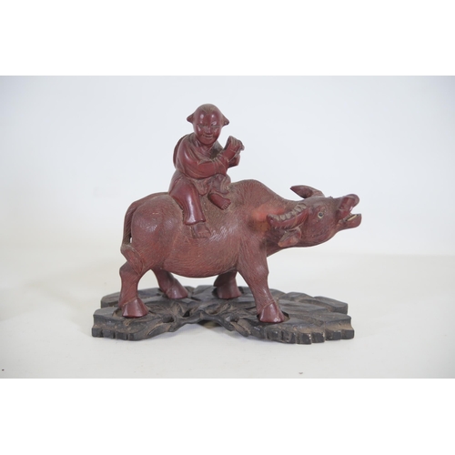 29 - Pair of 19th/20th-Century Antique Chinese Ornaments Depicting People Riding Oxen  This exquisite pai... 