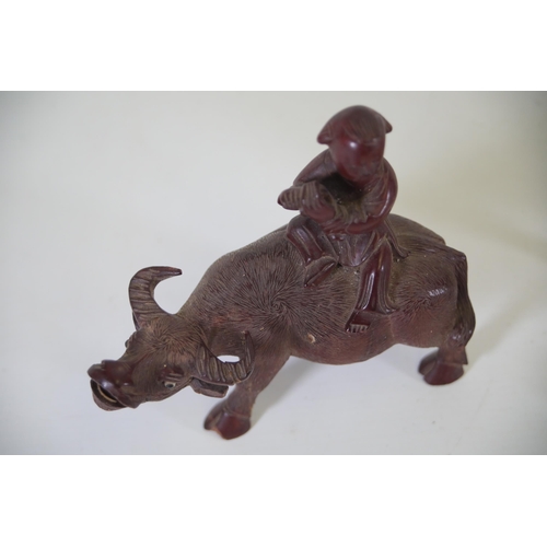 29 - Pair of 19th/20th-Century Antique Chinese Ornaments Depicting People Riding Oxen  This exquisite pai... 