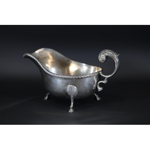 3 - Silver Dublin Hallmarked Gravy Sauce Boat, Finnigans Manchester Ltd  This silver gravy or sauce boat... 