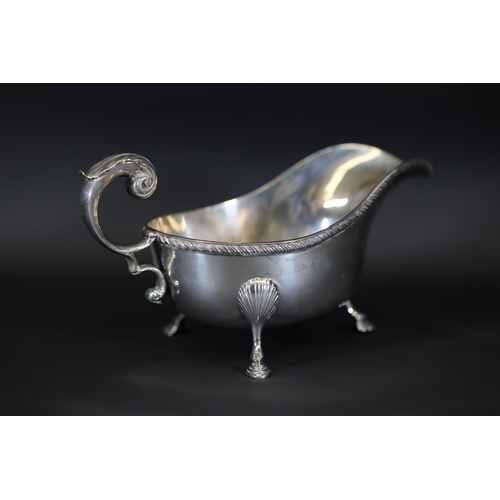 3 - Silver Dublin Hallmarked Gravy Sauce Boat, Finnigans Manchester Ltd  This silver gravy or sauce boat... 