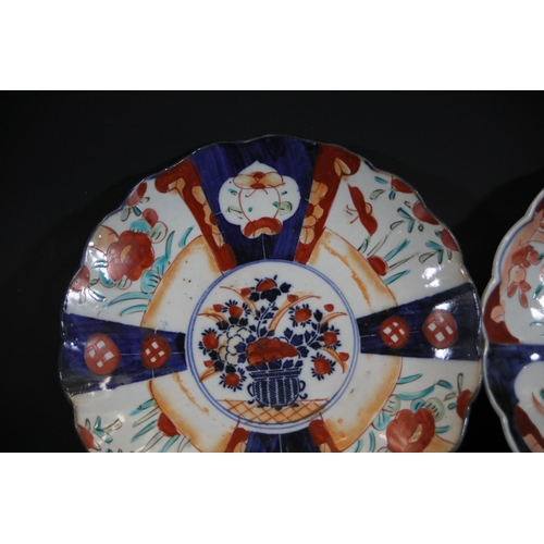 30 - Pair of 18th-Century Chinese Export Imari Porcelain Plates with Floral Motifs  This offering compris... 