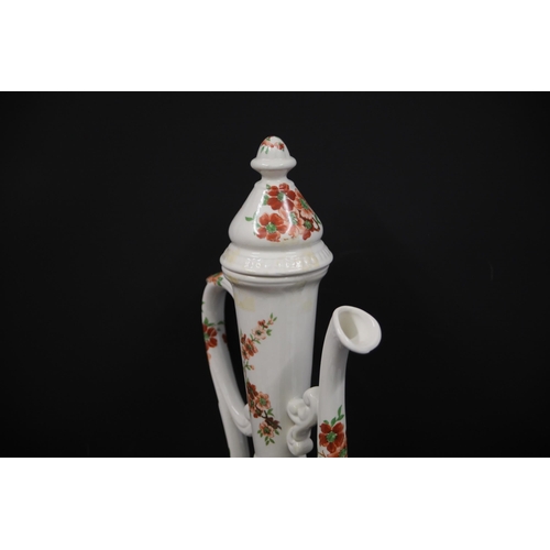 32 - Antique Porcelain Ewer with Chinese Pattern  This exquisite antique porcelain ewer, standing 19.5 in... 