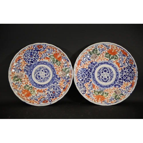 38 - Pair of Imari Dinner Plates  This exquisite pair of Imari dinner plates feature elaborate floral and... 