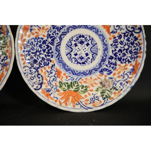 38 - Pair of Imari Dinner Plates  This exquisite pair of Imari dinner plates feature elaborate floral and... 