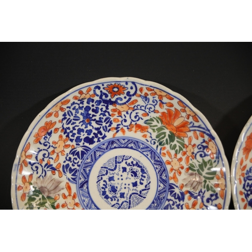 38 - Pair of Imari Dinner Plates  This exquisite pair of Imari dinner plates feature elaborate floral and... 