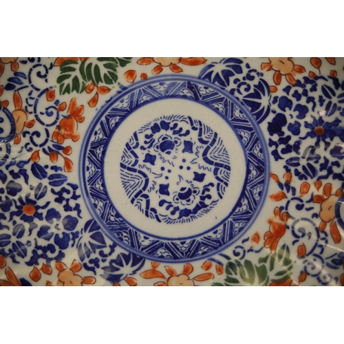 38 - Pair of Imari Dinner Plates  This exquisite pair of Imari dinner plates feature elaborate floral and... 