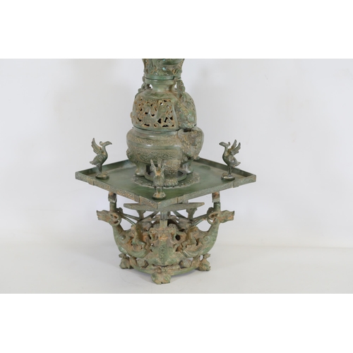 42 - Archaic Bronze Chinese Incense Burner with Intricate Animal Decorations  This exquisite example of a... 