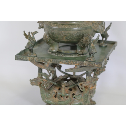 42 - Archaic Bronze Chinese Incense Burner with Intricate Animal Decorations  This exquisite example of a... 