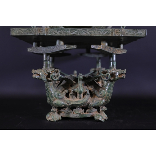 42 - Archaic Bronze Chinese Incense Burner with Intricate Animal Decorations  This exquisite example of a... 