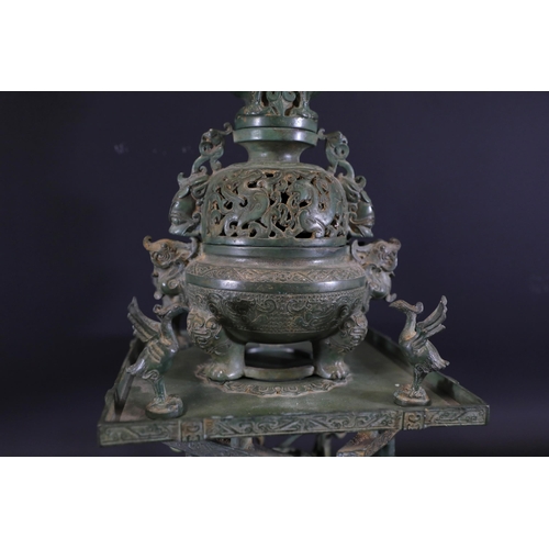 42 - Archaic Bronze Chinese Incense Burner with Intricate Animal Decorations  This exquisite example of a... 