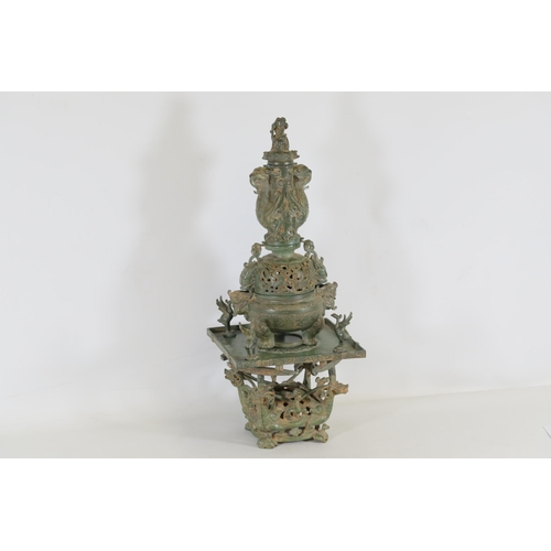 42 - Archaic Bronze Chinese Incense Burner with Intricate Animal Decorations  This exquisite example of a... 