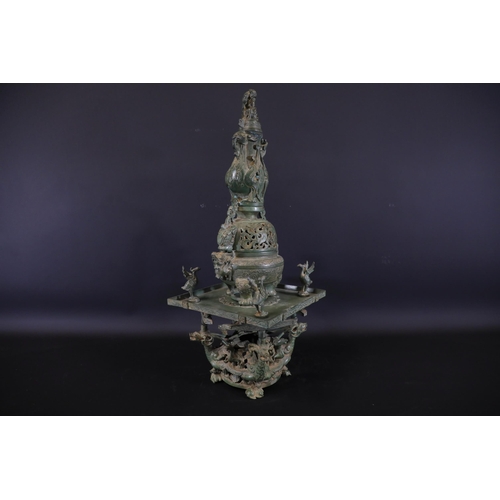 42 - Archaic Bronze Chinese Incense Burner with Intricate Animal Decorations  This exquisite example of a... 