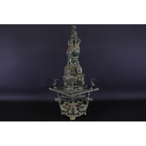 42 - Archaic Bronze Chinese Incense Burner with Intricate Animal Decorations  This exquisite example of a... 