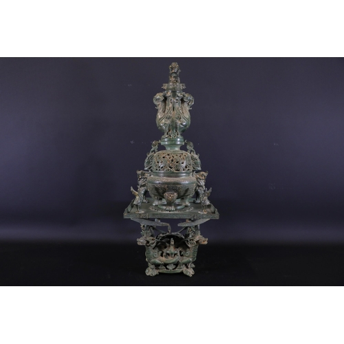 42 - Archaic Bronze Chinese Incense Burner with Intricate Animal Decorations  This exquisite example of a... 