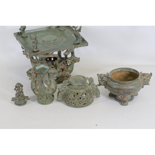 42 - Archaic Bronze Chinese Incense Burner with Intricate Animal Decorations  This exquisite example of a... 