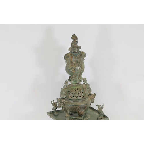 42 - Archaic Bronze Chinese Incense Burner with Intricate Animal Decorations  This exquisite example of a... 